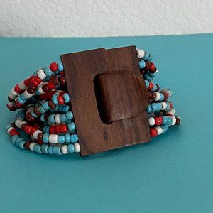 Women's Hand-Beaded Cream, blue, & red Bracelete With Wooden Buckle Clasp